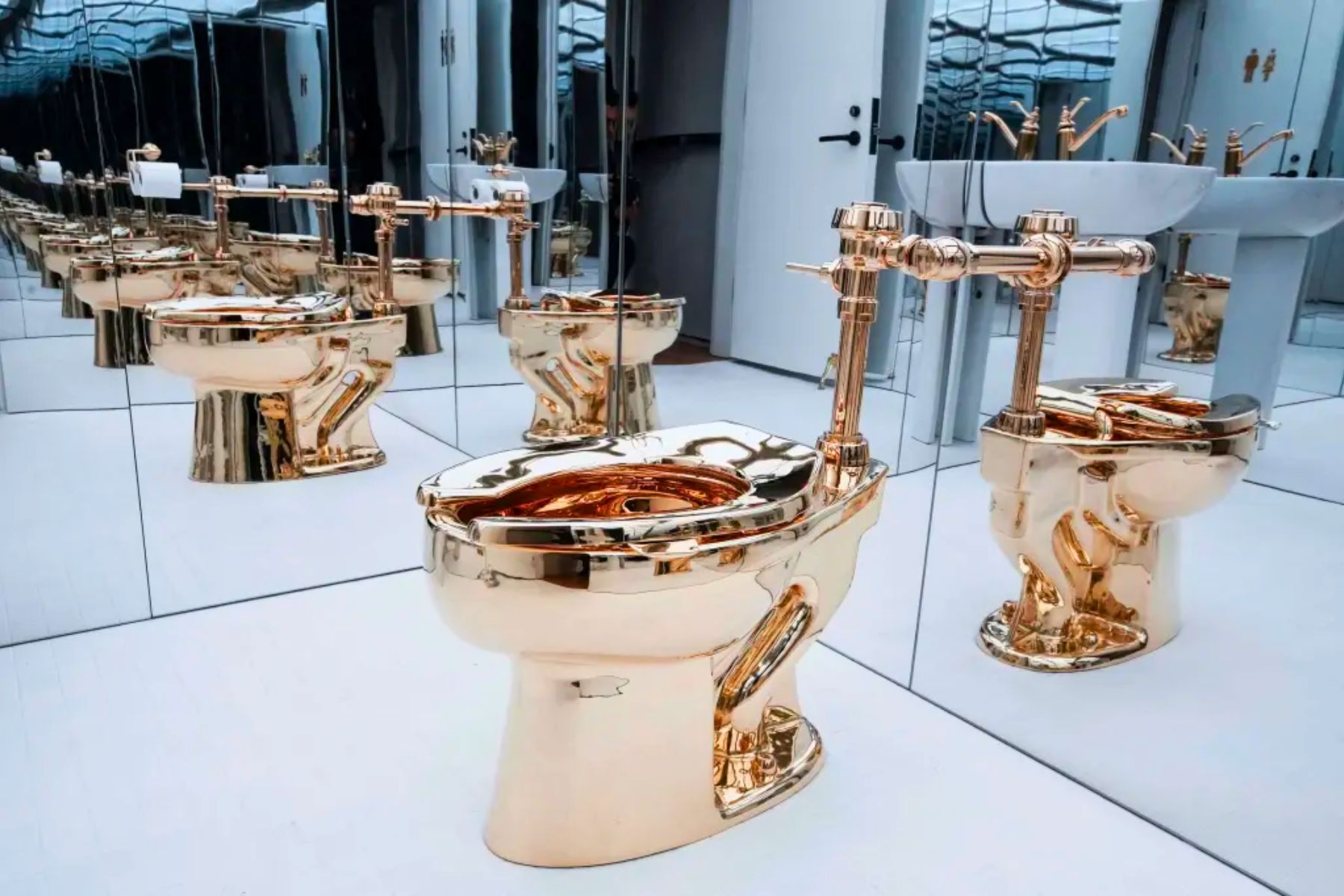 An 18-Karat Gold Toilet Fetches $12 Million at Sotheby’s Auction
